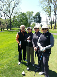 women in golf gear